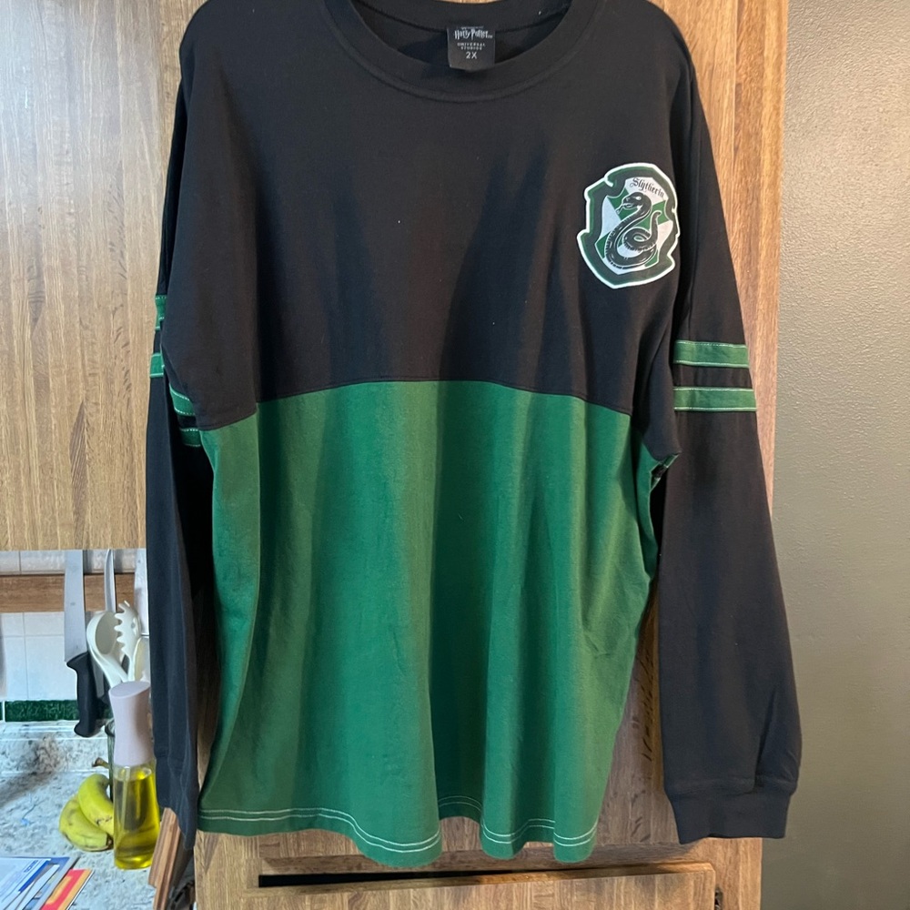 Universal Black Long Sleeve Wizarding World Tee with Green Accent